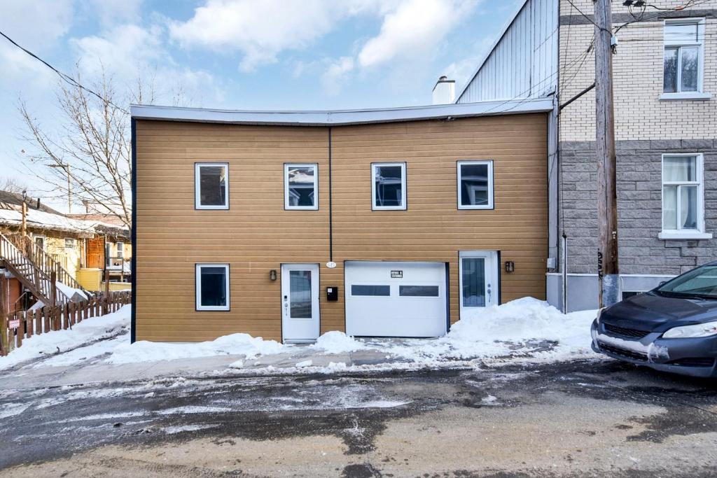 2-storey house with garage and interior terrace